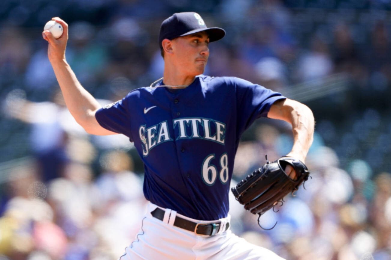 Seattle Mariners starting pitcher George Kirby throws against the Minnesota Twins during the first inning of a baseball game, Thursday, July 20, 2023, in Seattle. (AP Photo/Lindsey Wasson)