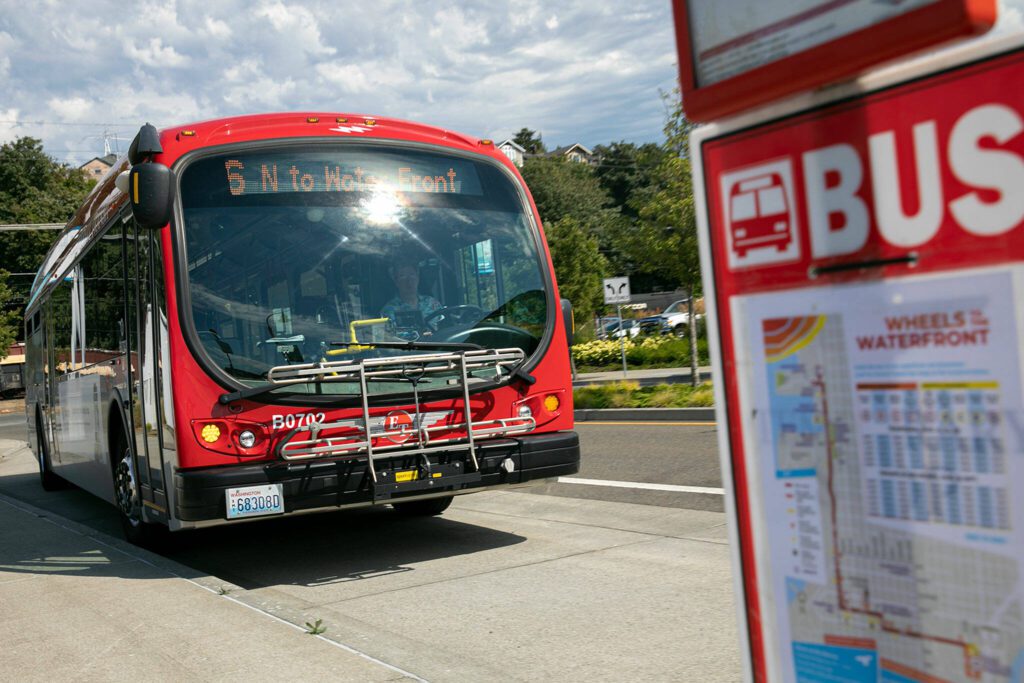 An Everett Transit Route 6 bus arrives Monday, Aug. 1, 2022, at the 13th Street stop near the Port of Everett in Everett, Washington. (Ryan Berry / Herald file)
