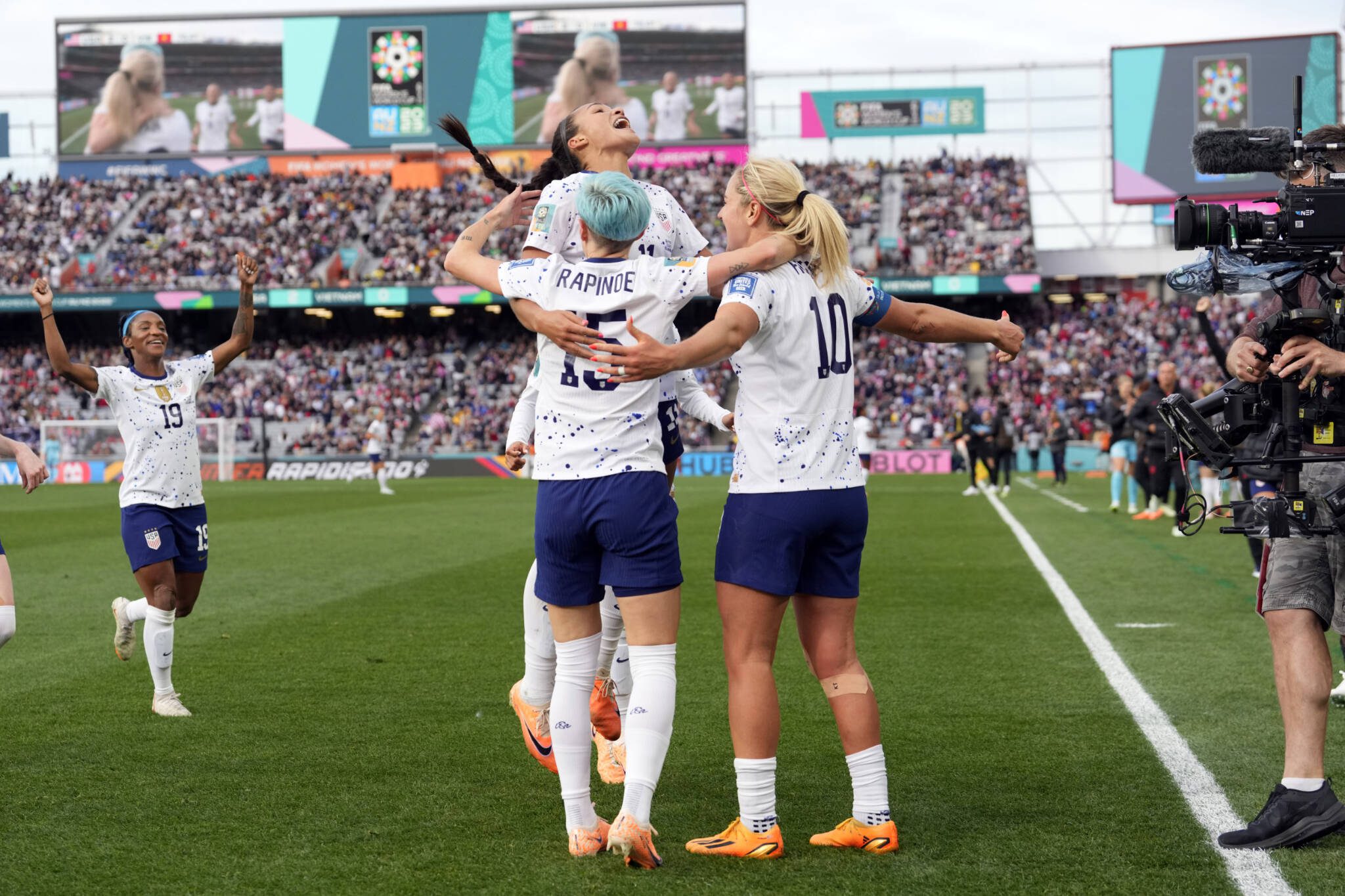 The United States’ Lindsey Horan (10), Megan Rapinoe (15) and Sophia Smith celebrate after Horan scored a goal during the second half of a Women’s World Cup soccer match against Vietnam on Saturday at Eden Park in Auckland, New Zealand. (AP Photo/Abbie Parr)
