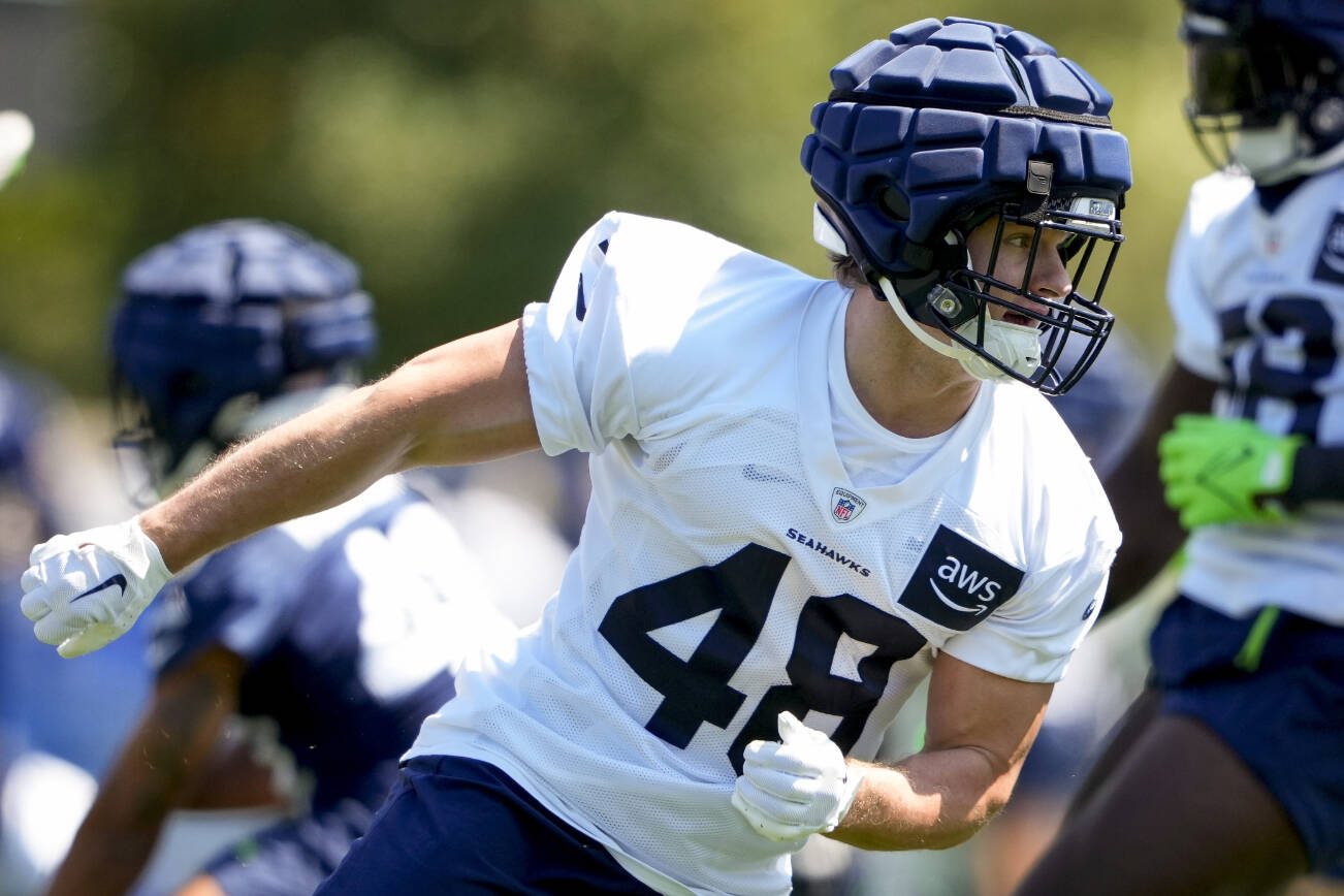 Seattle Seahawks linebacker Ben Burr-Kirven (48) runs a drill during the NFL football team's training camp, Thursday, July 27, 2023, in Renton, Wash. (AP Photo/Lindsey Wasson)