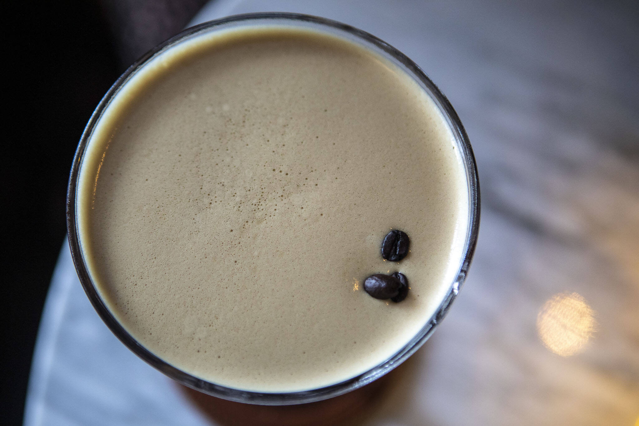 A coffee flavored whiskey drink at the Muse Whiskey and Coffee in Everett, Washington on Monday, July 24, 2023. (Annie Barker / The Herald)