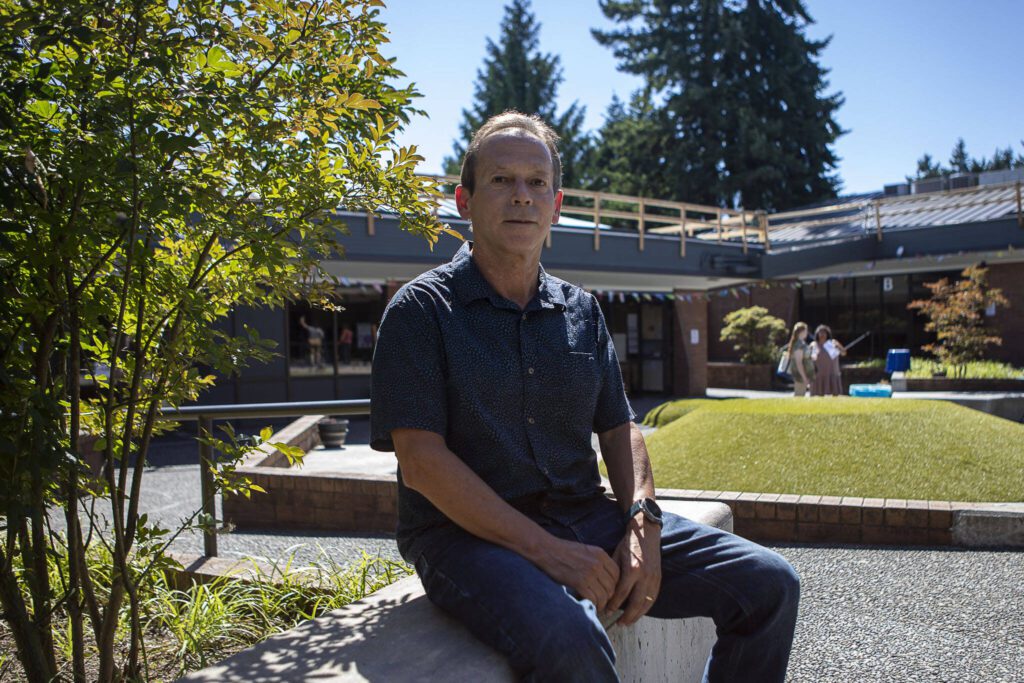 Village on Casino Road Director Alvaro Guillen poses for a photo at Connect Casino Road in Everett, Washington on Tuesday, Aug. 15, 2023. (Annie Barker / The Herald)
