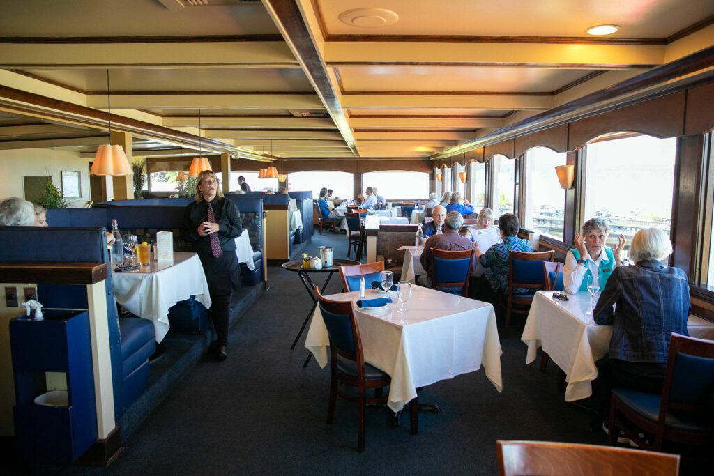 The afternoon lunch crowd slowly builds on the top floor dining room at Arnies restaurant on Friday, August 11, 2023, in Mukilteo, Washington. (Ryan Berry / The Herald)
