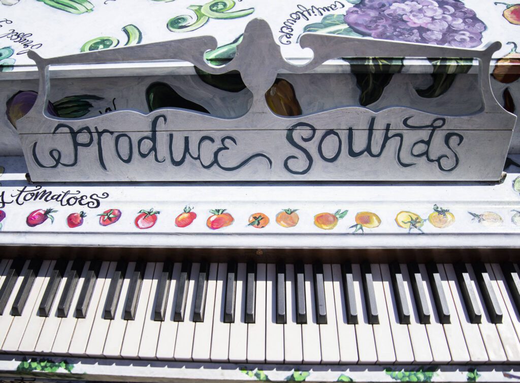 The “Produce Sounds” piano by Elizabeth Person on display in front of the Sno-Isle Food Co-op on Wednesday, Aug. 16, 2023 in Everett, Washington. (Olivia Vanni / The Herald)
