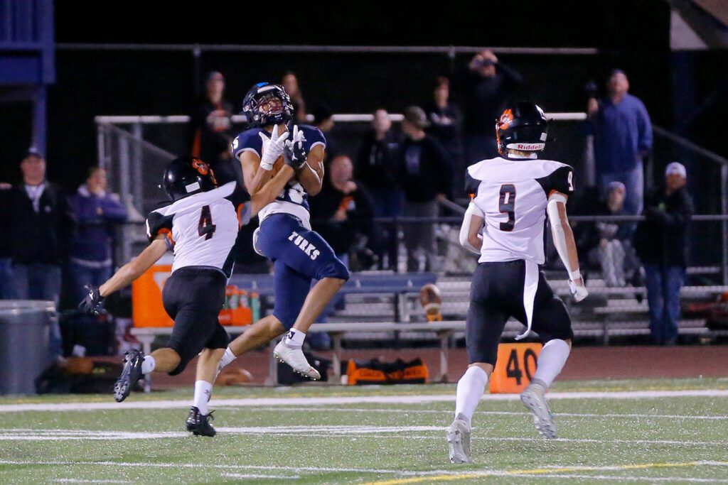 Sultan’s Junior Vargas comes down with a deep ball against Granite Falls on Sept. 30, 2022, at Sultan High School in Sultan. (Ryan Berry / The Herald)
