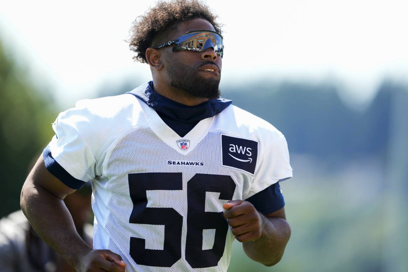 Seattle Seahawks linebacker Jordyn Brooks jogs off the field after the NFL football team's training camp Thursday, July 27, 2023, in Renton, Wash. (AP Photo/Lindsey Wasson)