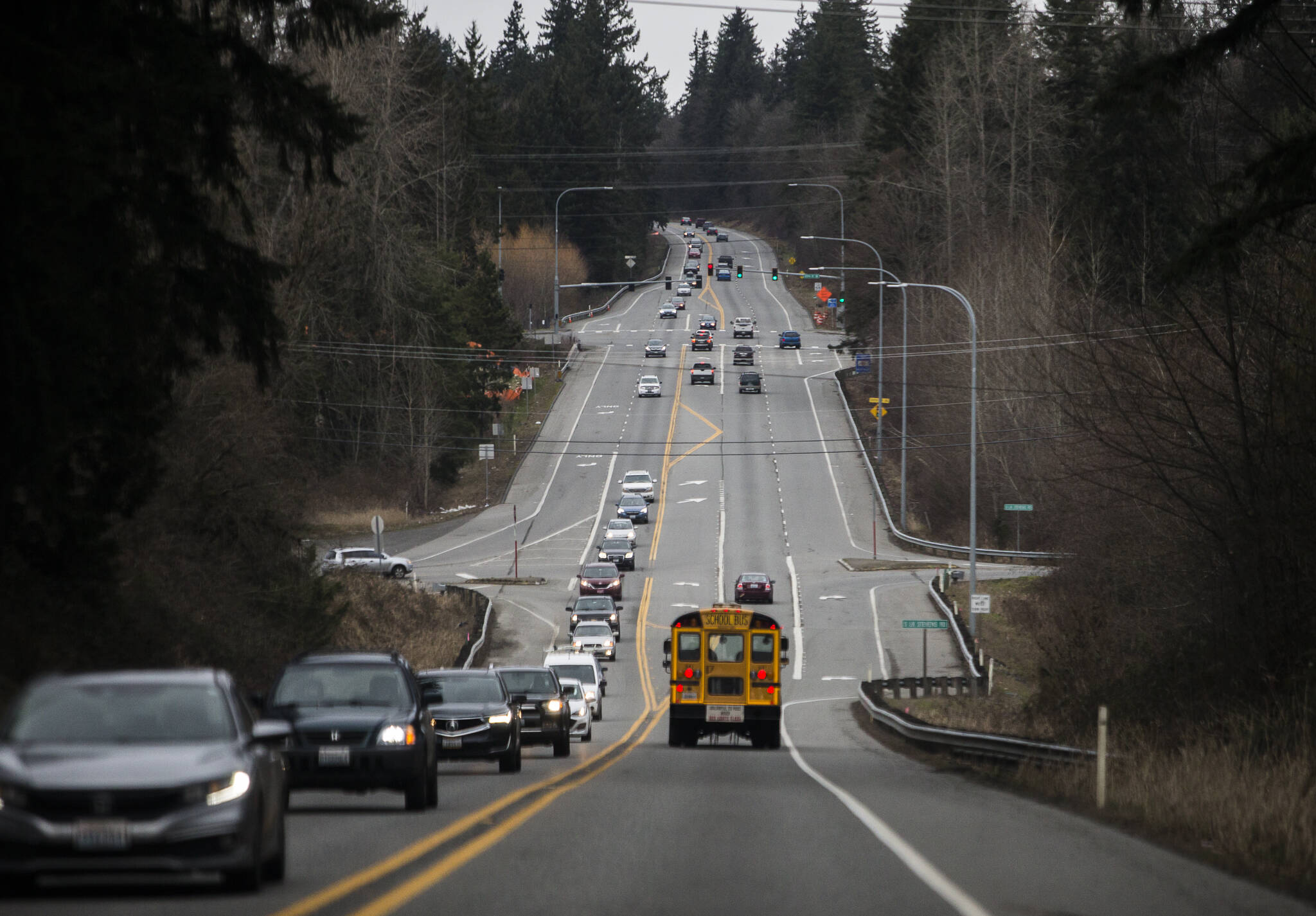Cars drive along the intersection of Highway 9 and South Lake Stevens Road on Thursday, Feb. 17, 2022 in Lake Stevens, Washington. (Olivia Vanni / The Herald)
