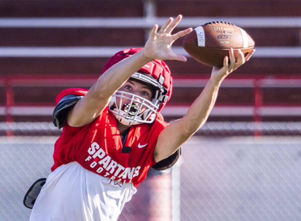 A Stanwood player makes a catch during practice on Friday, Aug. 18, 2023 in Stanwood, Washington. (Olivia Vanni / The Herald)
