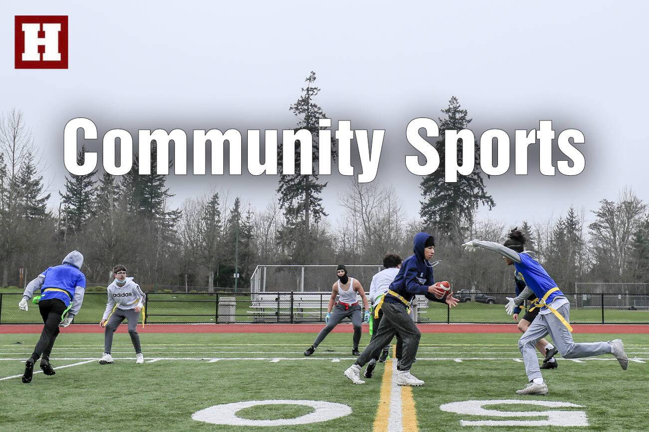 The Everett Elite Flag Football 14-under team practices Sunday morning at Harbour Pointe Middle School in Mukilteo, Washington on January 16, 2022. (Kevin Clark / The Herald)