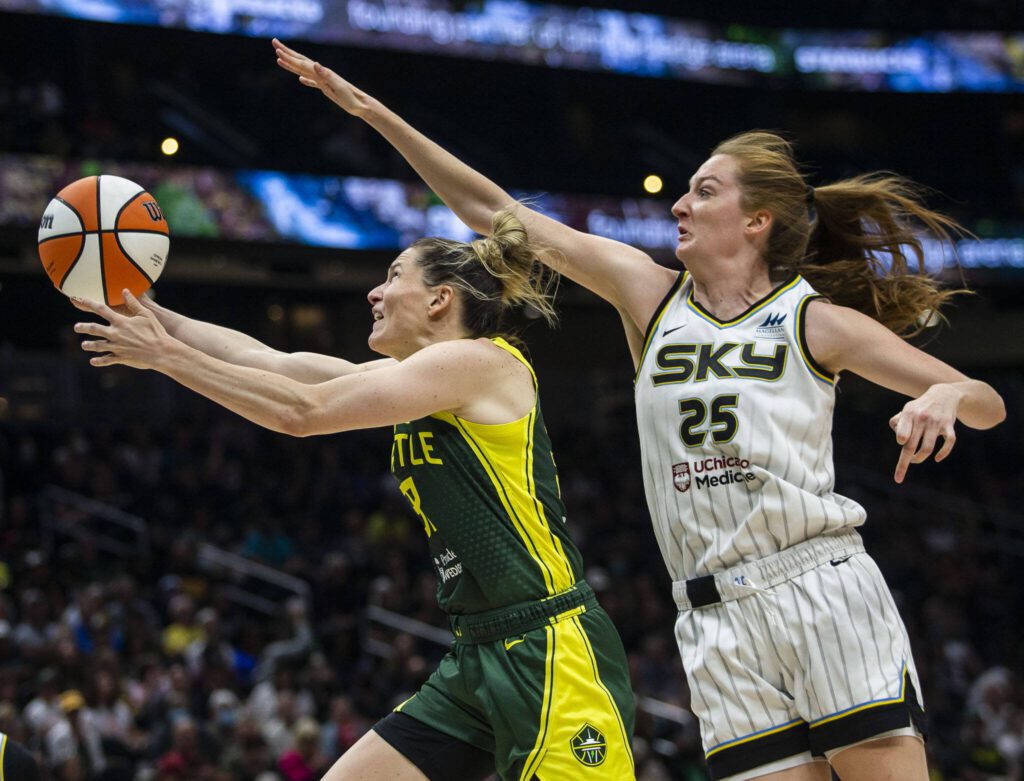 Seattle Storm’s Sami Whitcomb beats Chicago Sky’s Morgan Bertsch to the hoop to make a layup during the game at Climate Pledge Arena on Sunday, Aug. 27, 2023 in Seattle, Washington. (Olivia Vanni / The Herald)