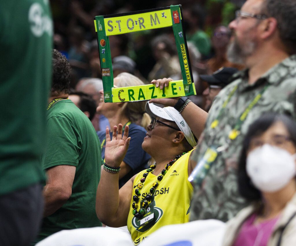 Storm fans cheer on the team during the game against the Chicago Sky at Climate Pledge Arena on Sunday, Aug. 27, 2023 in Seattle, Washington. (Olivia Vanni / The Herald)