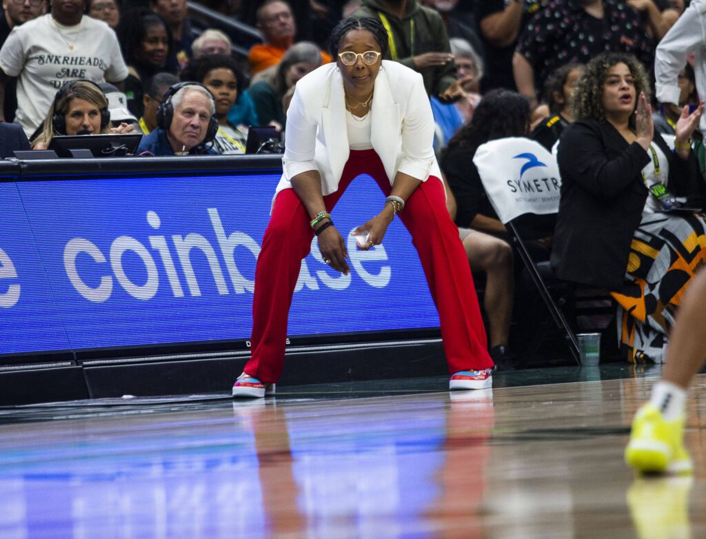 Seattle Storm head coach Noelle Quinn watches her team in the final seconds of the game against the Chicago Sky at Climate Pledge Arena on Sunday, Aug. 27, 2023 in Seattle, Washington. (Olivia Vanni / The Herald)
