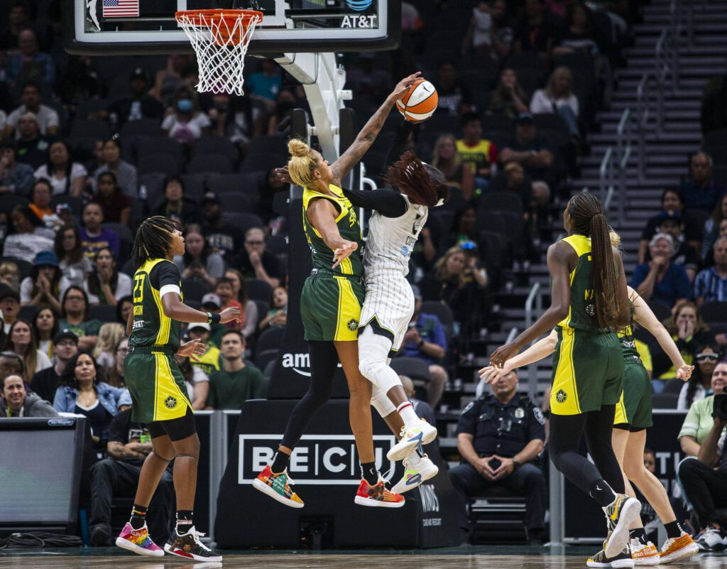 Seattle Storm’s Mercedes Russell blocks a shot by Chicago Sky’s Kahleah Copper during the game at Climate Pledge Arena on Sunday, Aug. 27, 2023 in Seattle, Washington. (Olivia Vanni / The Herald)