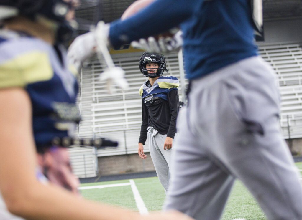 Jacoby Falor lines up for a route-running drill during practice on Wednesday at Arlington High School. (Olivia Vanni / The Herald)
