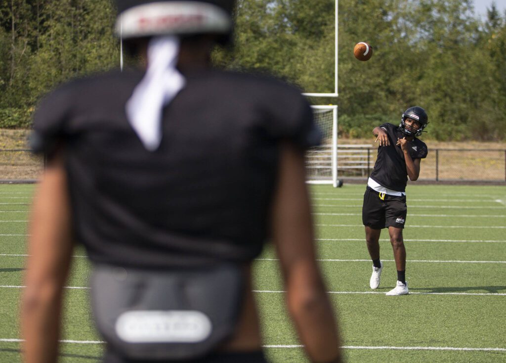 Archbishop Murphy’s Isaak Smith throws the football during practice on Thursday, Aug. 24, 2023 in Everett, Washington. (Olivia Vanni / The Herald)
