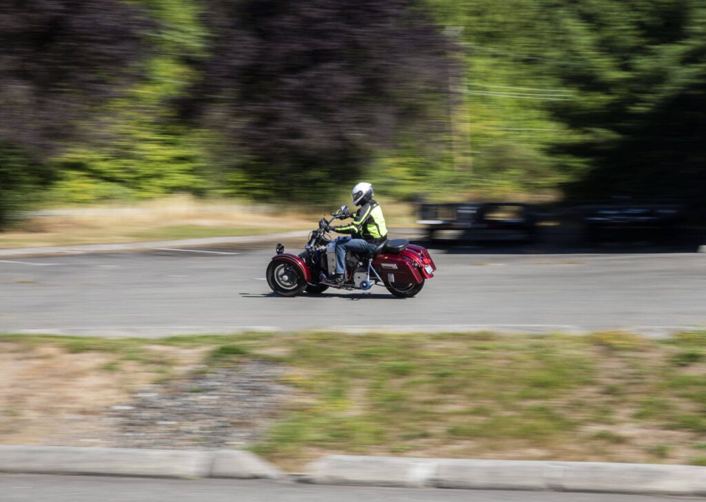 Bill Messing takes the prototype for a quick demonstration ride around the parking lot on Wednesday, Aug. 16, 2023 in Granite Falls, Washington. (Olivia Vanni / The Herald)
