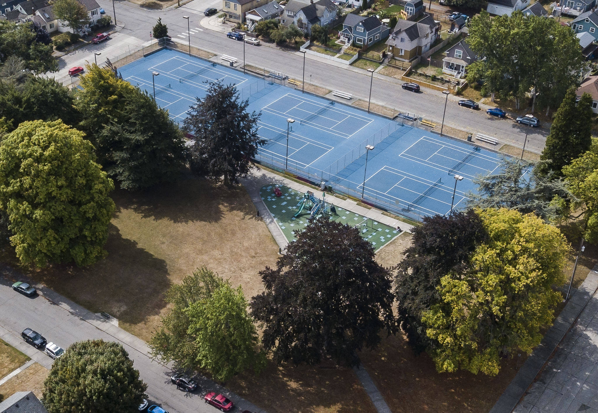 People use the playground at Clark Park on Thursday, Aug. 31, 2023 in Everett, Washington. (Olivia Vanni / The Herald)