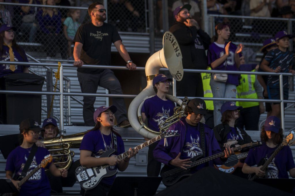 The Lake Stevens marching band performs during a football game between Lake Stevens and Garfield at Lake Stevens High School in Lake Stevens, Washington on Friday, Sept. 1, 2023. The Vikings won 48-21.. (Annie Barker / The Herald)
