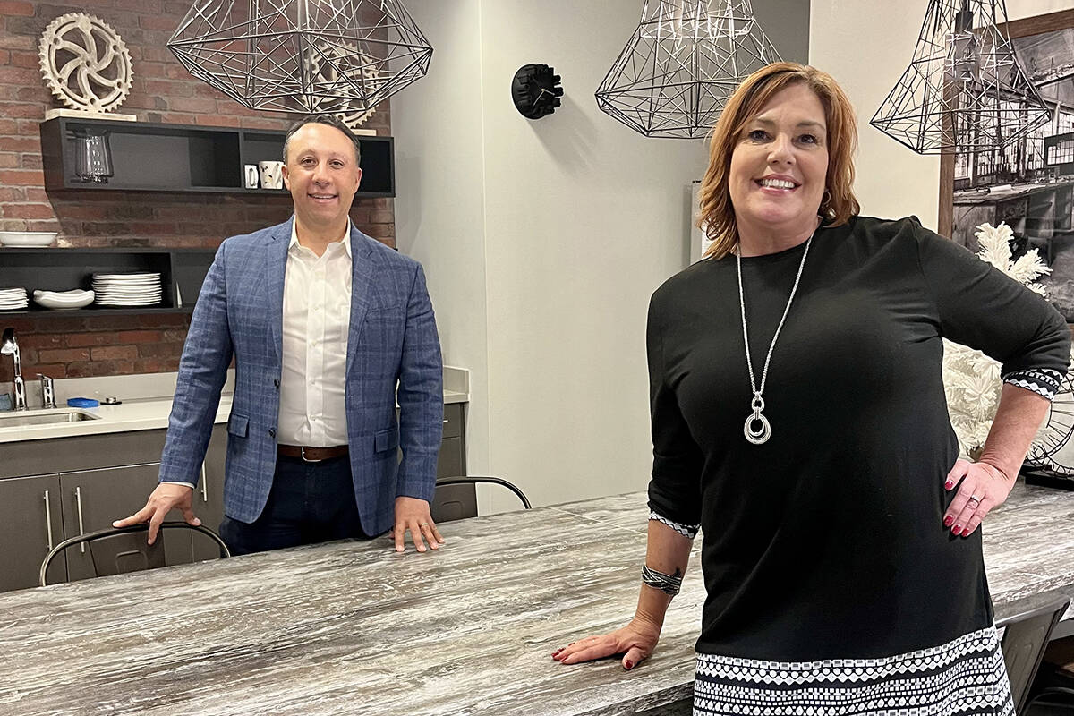 Sheila Rowe, a paralegal at Walton Law, and Christopher Walton, founder and managing partner of Walton Law.