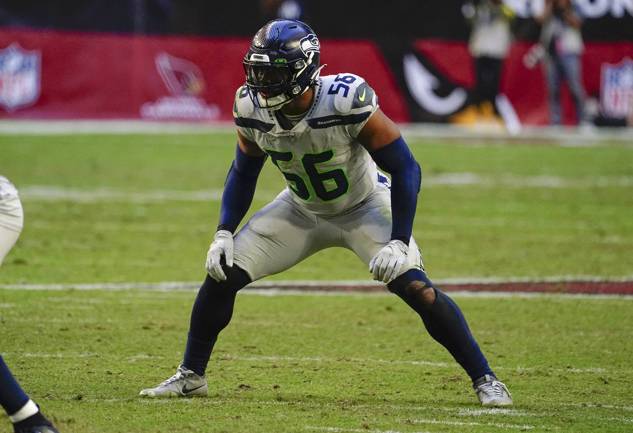 The Seahawks’ Jordyn Brooks waits for the snap during a game against the Cardinals on Nov. 6, 2022, in Glendale, Ariz. (AP Photo/Darryl Webb)