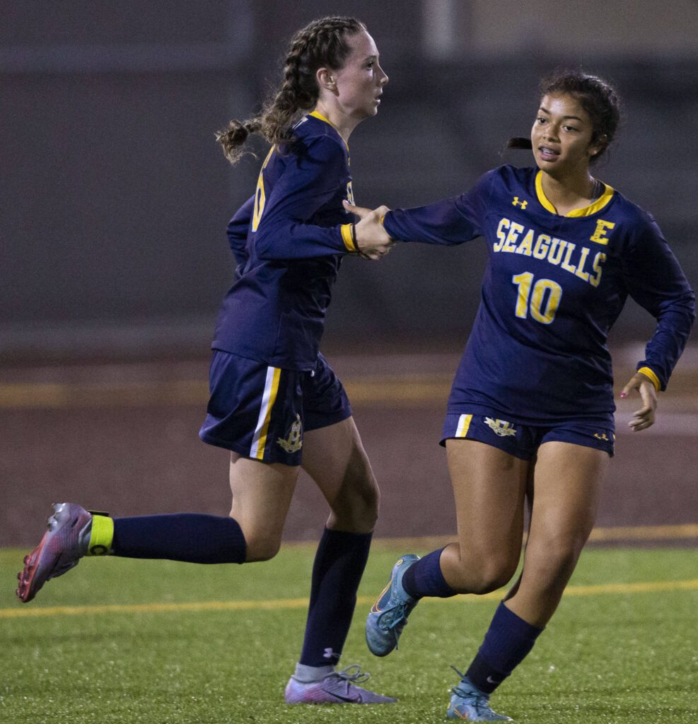 Everett’s Avery Marsall is high-fived by teammate Genesis Molina Escobar after scoring a goal during the game against Monroe on Thursday, Sept. 7, 2023 in Everett, Washington. (Olivia Vanni / The Herald)
