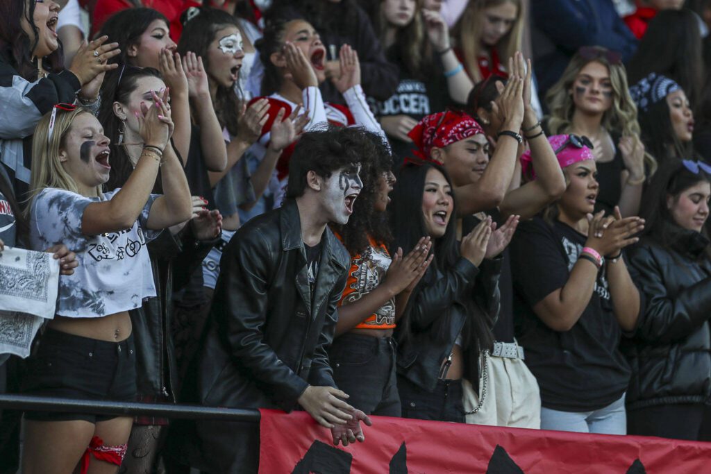 Fans cheer during a football game between Marysville Pilchuck and Stanwood at Marysville Pilchuck High School in Marysville, Washington on Friday, Sept. 8, 2023. Marysville Pilchuck takes the win, 36-7. (Annie Barker / The Herald)
