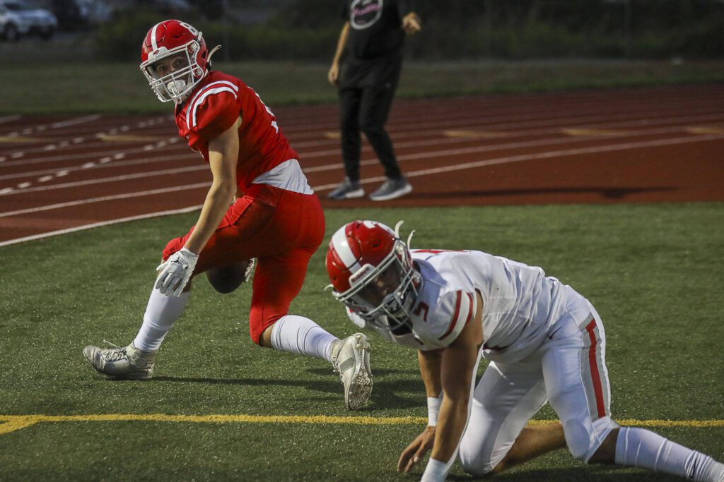 Marysville Pilchuck’s Maksim Tchelouchkin (8) reacts to a call during a football game between Marysville Pilchuck and Stanwood at Marysville Pilchuck High School in Marysville, Washington on Friday, Sept. 8, 2023. Marysville Pilchuck takes the win, 36-7. (Annie Barker / The Herald)
