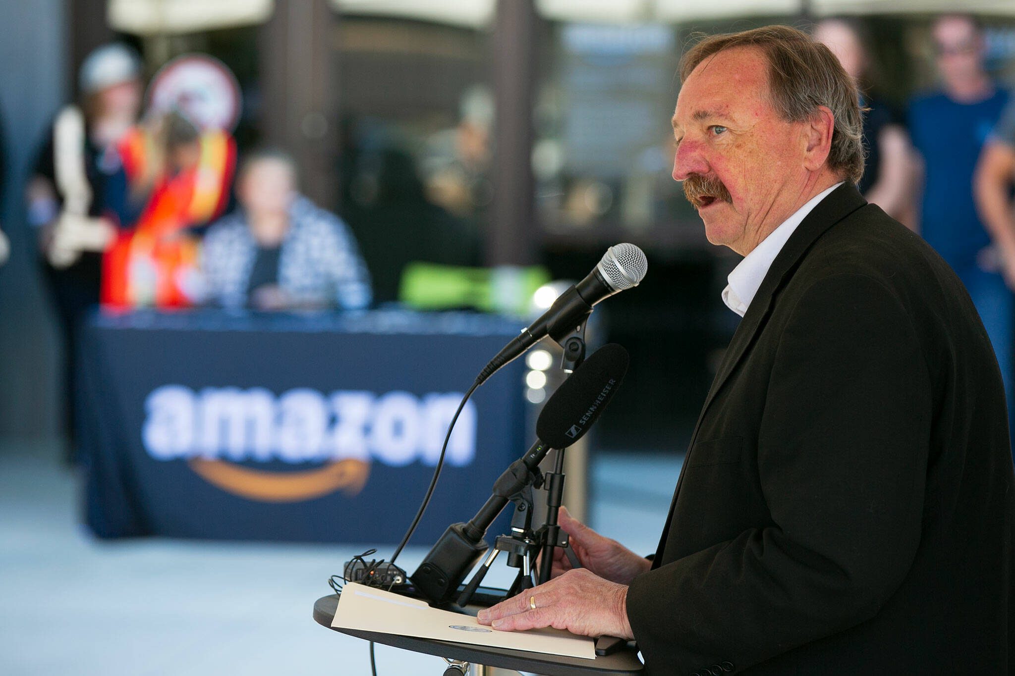 Snohomish County Executive Dave Somers speaks to the crowd during an opening ceremony at the new PAE2 Amazon Fulfillment Center on Thursday, Sept. 14, 2023, in Arlington, Washington. (Ryan Berry / The Herald)