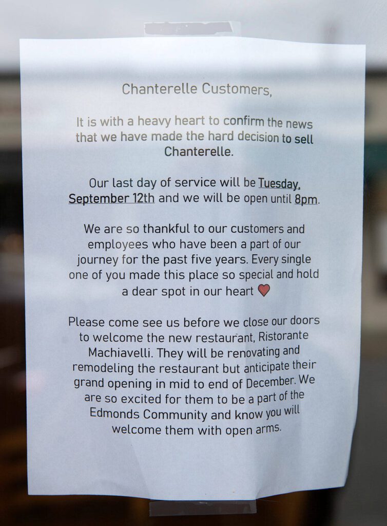 A farewell message is posted on the door during Chanterelle’s final day of business Tuesday, Sept. 12, 2023, in downtown Edmonds, Washington. (Ryan Berry / The Herald)
