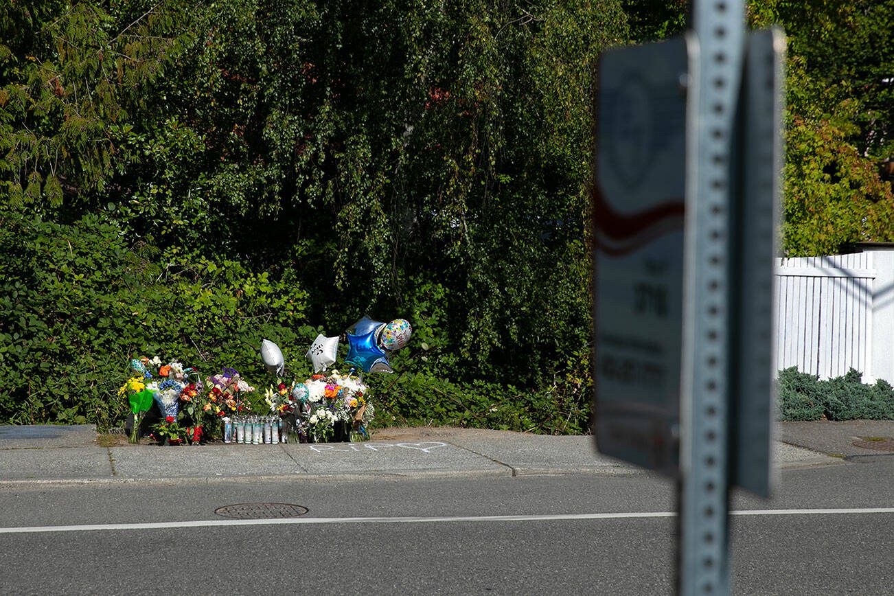 A memorial for a 15-year-old shot and killed last week is set up at a bus stop along Hardeson Road on Wednesday, Sept. 13, 2023, in Everett, Washington. (Ryan Berry / The Herald)