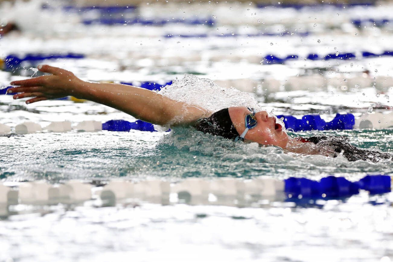 Snohomish junior Mary Clarke takes the victory in the 100 yard backstroke during an early season meet between Snohomish and Lake Stevens on Tuesday, Sept. 12, 2023, at the Snohomish Aquatic Center in Snohomish, Washington. (Ryan Berry / The Herald)