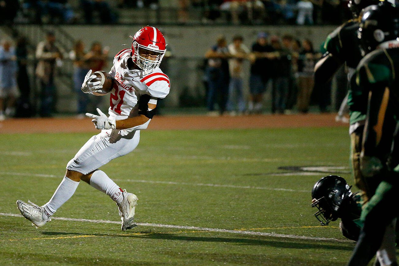 Marysville Pilchuck running back Kenai Sinaphet waltzes into the end zone for a first half touchdown against Marysville Getchell during the Berry Bowl on Friday, Sept. 15, 2023, at Quil Ceda Stadium in Marysville, Washington. (Ryan Berry / The Herald)
