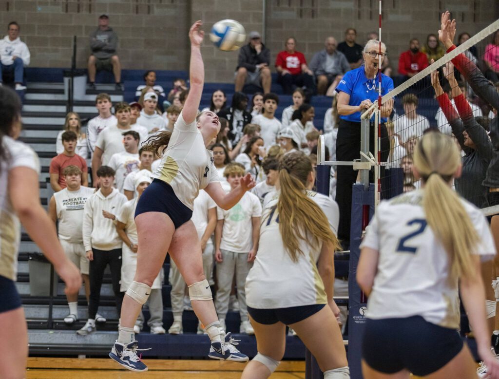 Arlington’s Melissa Hadley spikes the ball during the game against Arlington on Tuesday, Sept. 19, 2023 in Arlington, Washington. (Olivia Vanni / The Herald)
