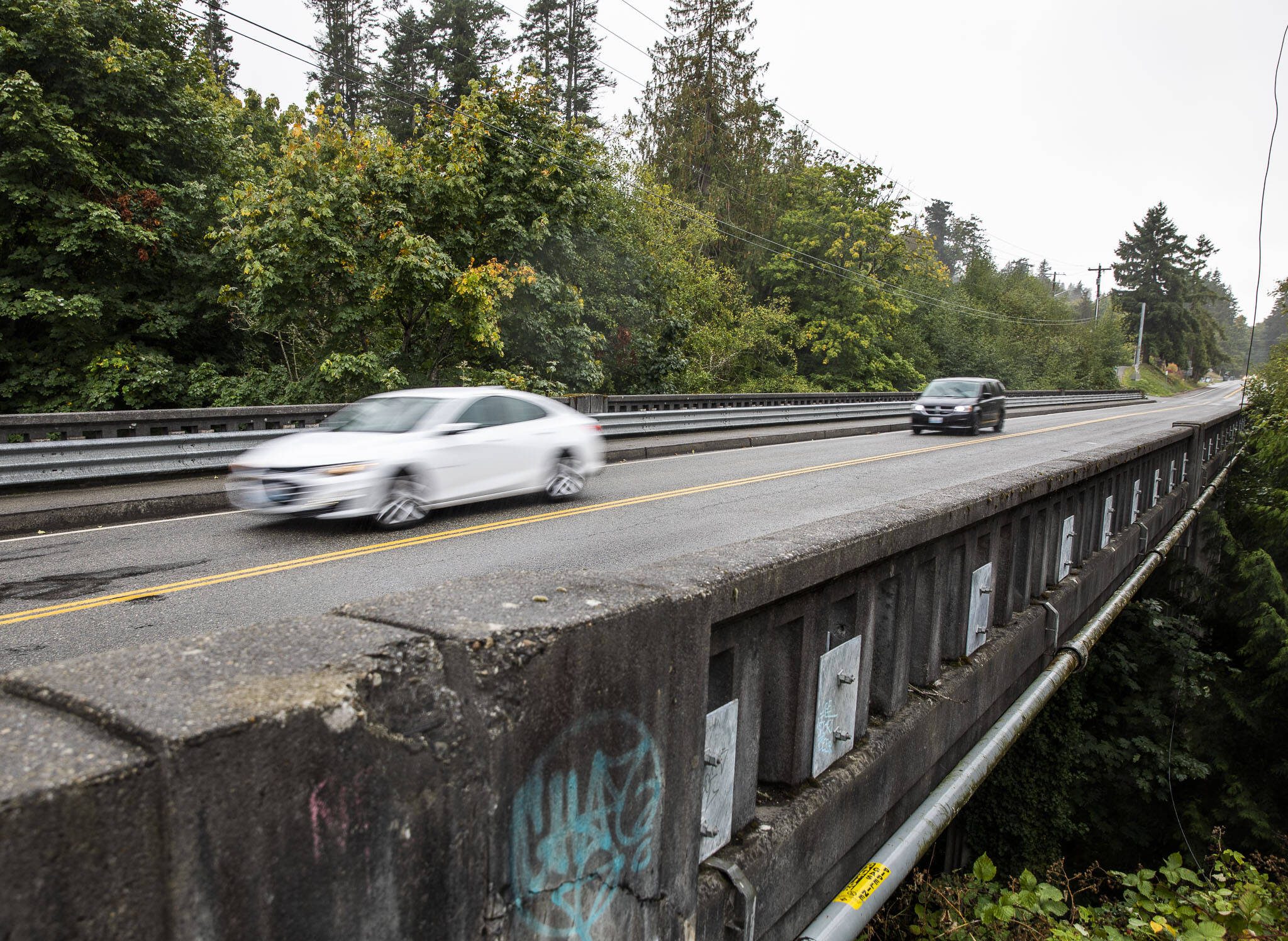 Cars move across Edgewater Bridge between Everett and Mukilteo. The project to replace the bridge, built in 1946, has been delayed again, this time until mid-2024. (Olivia Vanni / The Herald)