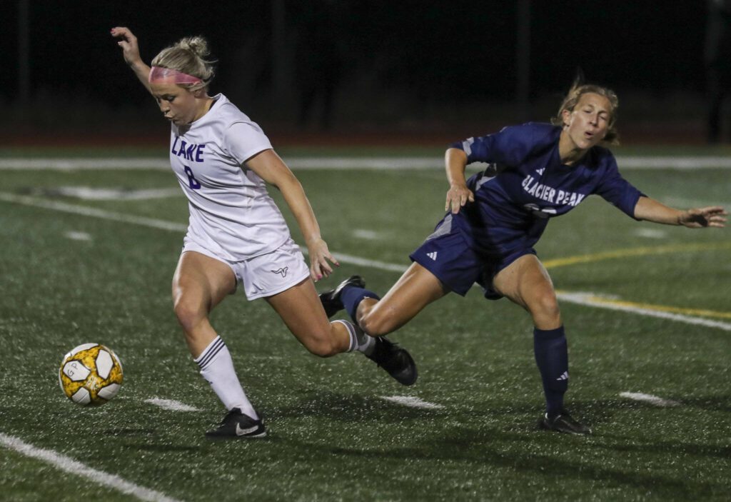 Lake Stevens’ Zoe Hopkins (8) steals the ball during a girls soccer game between Glacier Peak and Lake Stevens at Glacier Peak High School in Snohomish, Washington on Thursday, Sept. 21, 2023. Lake Stevens won, 2-1. (Annie Barker / The Herald)
