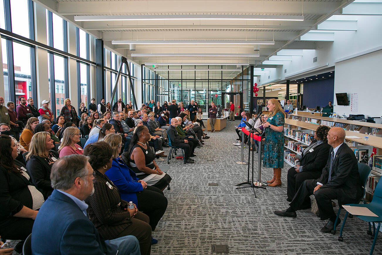 Lynn Deeken, the Dean of Arts, Learning Resources & Pathways at EvCC, addresses a large gathering during the ribbon cutting ceremony of the new Cascade Learning Center on Thursday, Sept. 28, 2023, at Everett Community College in Everett, Washington. (Ryan Berry / The Herald)