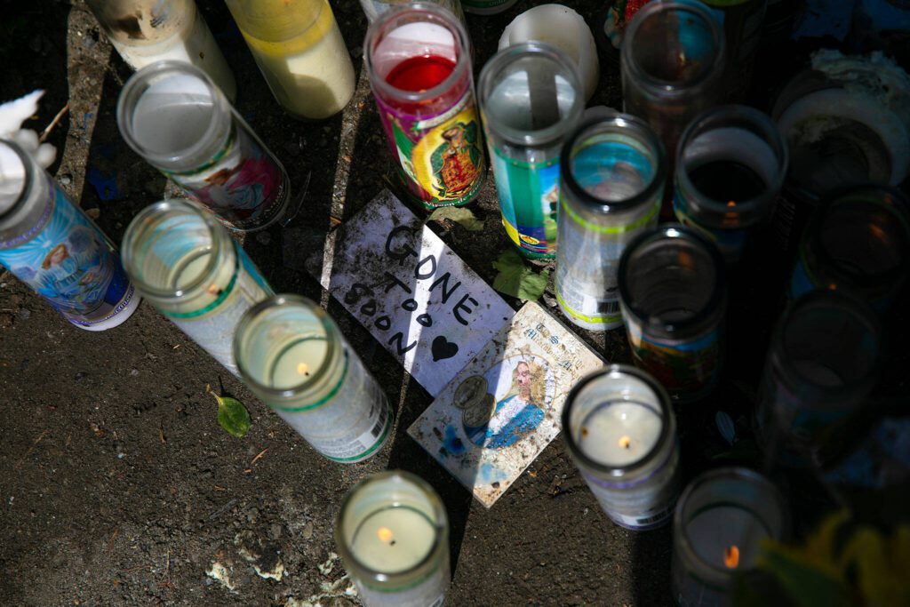 A memorial for a 15-year-old shot and killed last week is set up at a bus stop along Hardeson Road on Wednesday, Sept. 13, 2023, in Everett, Washington. (Ryan Berry / The Herald)
