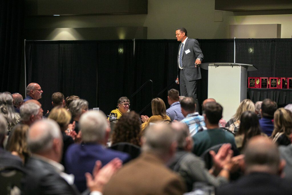 Keynote speaker Donald Watts speaks to the crowd during the 2023 Snohomish County Sports Hall of Fame Banquet on Wednesday, Sept. 27, 2023, at Angel of the Winds Arena in Everett, Washington. (Ryan Berry / The Herald)
