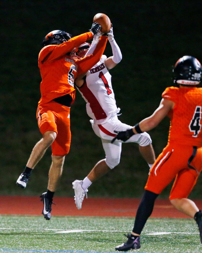 Monroe’s Deegan Chapman (6) comes down with an interception on a 50/50 ball against Mountlake Terrace on Friday, Sept. 29, 2023, at Monroe High School in Monroe, Washington. (Ryan Berry / The Herald)
