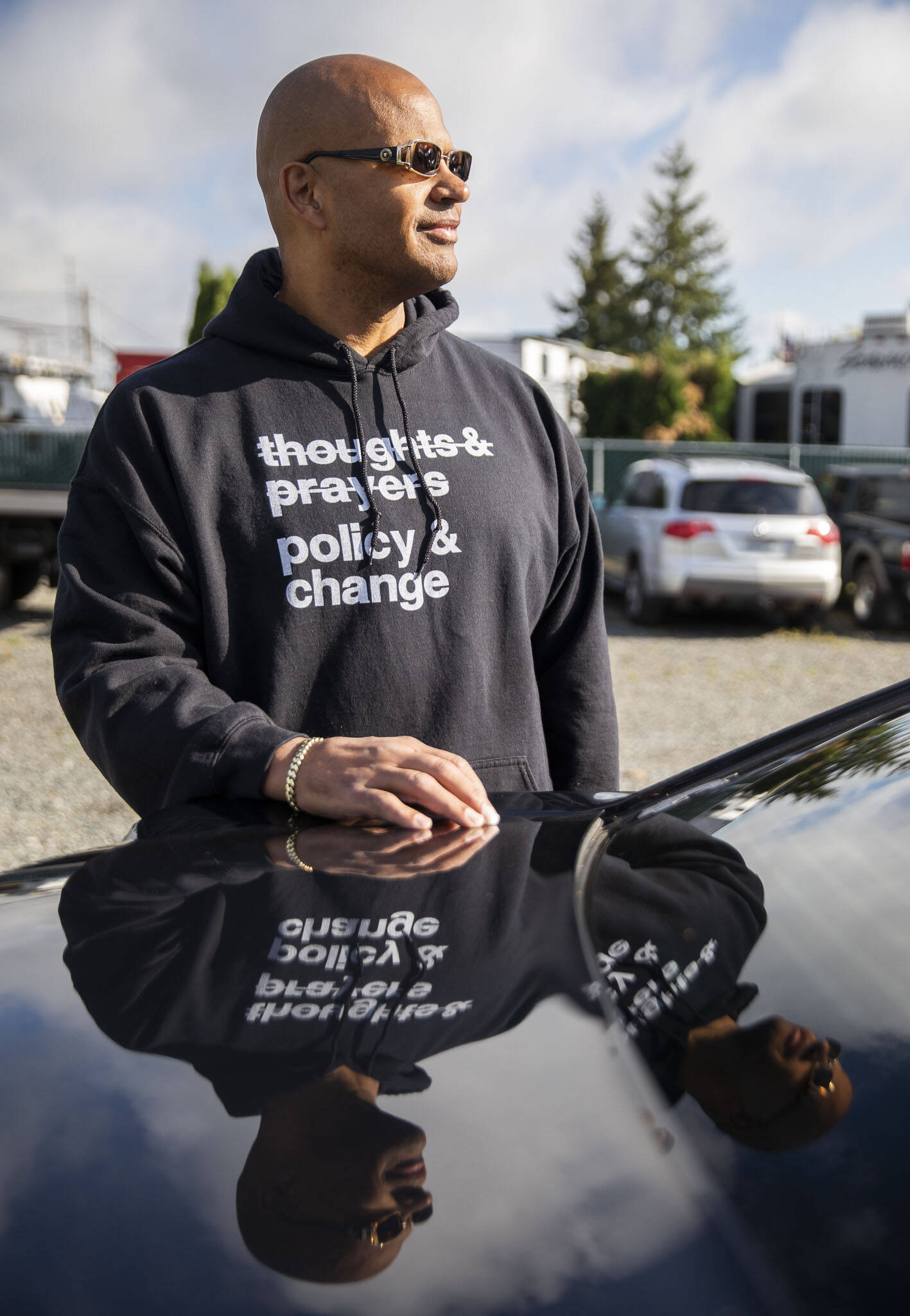 Percy Levy, who served 17 years for a drug house robbery, outside his new business Redemption Auto along Highway 99 on Thursday, Sept. 21, 2023 in Everett, Washington. (Olivia Vanni / The Herald)