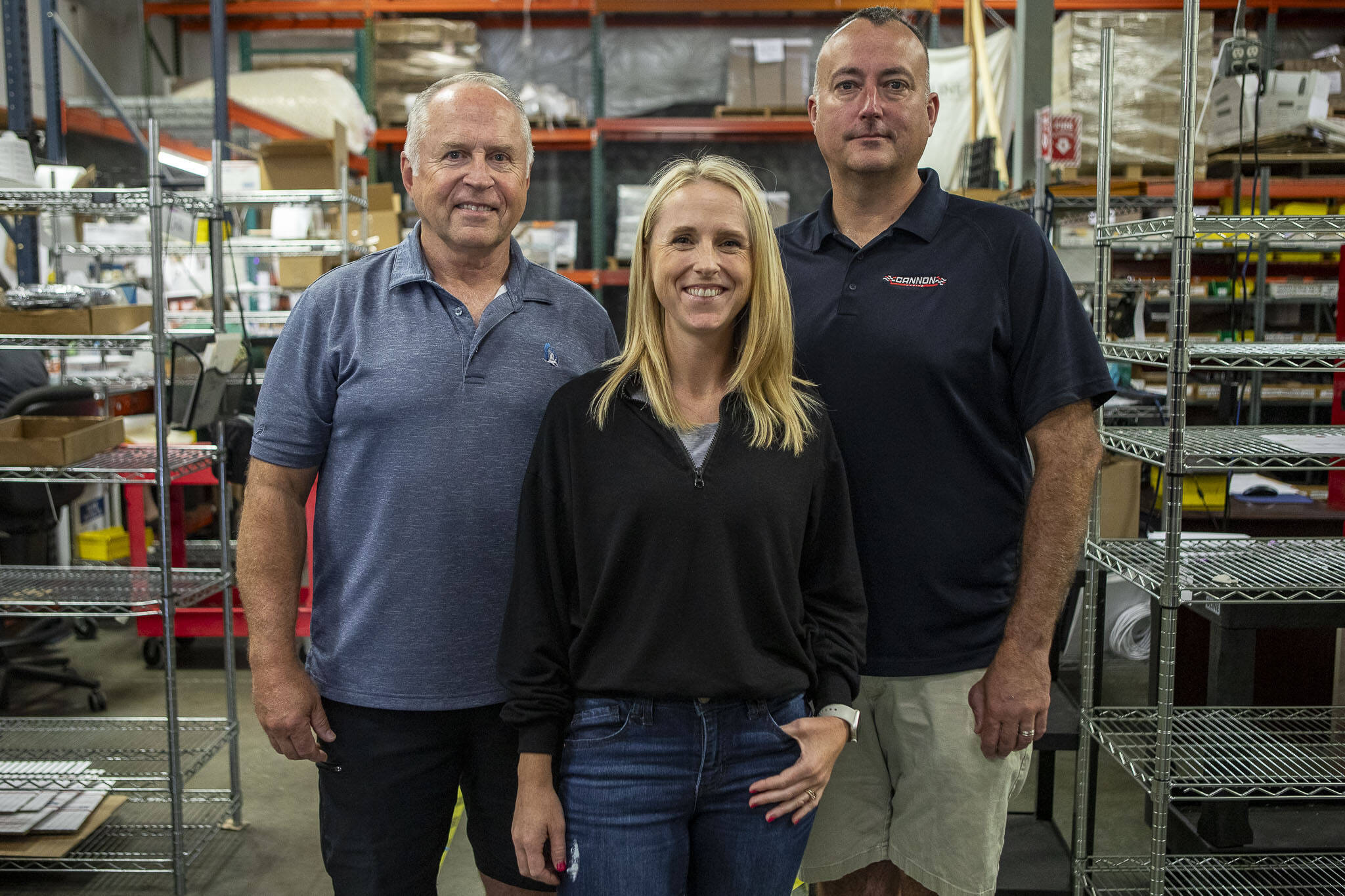 Left to right, president Bill Peterson, vice president Jamie Gamez, and executive vice president Jeff Cannon pose for a photo at Morris Magnets in Monroe, Washington, on Wednesday, Sept. 13, 2023. (Annie Barker / The Herald)