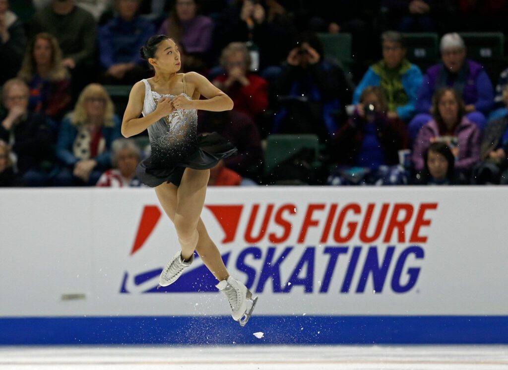 Kaori Sakamoto jumps during the ladies free skate program at the 2018 Skate America competition on Sunday at Angel of the Winds Arena in Everett, Washington. (Olivia Vanni / The Herald)
