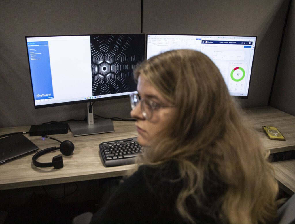 Jacy Wade waits for her first call of her shift at 988 on Friday, Oct. 6, 2023 in Everett, Washington. (Olivia Vanni / The Herald)
