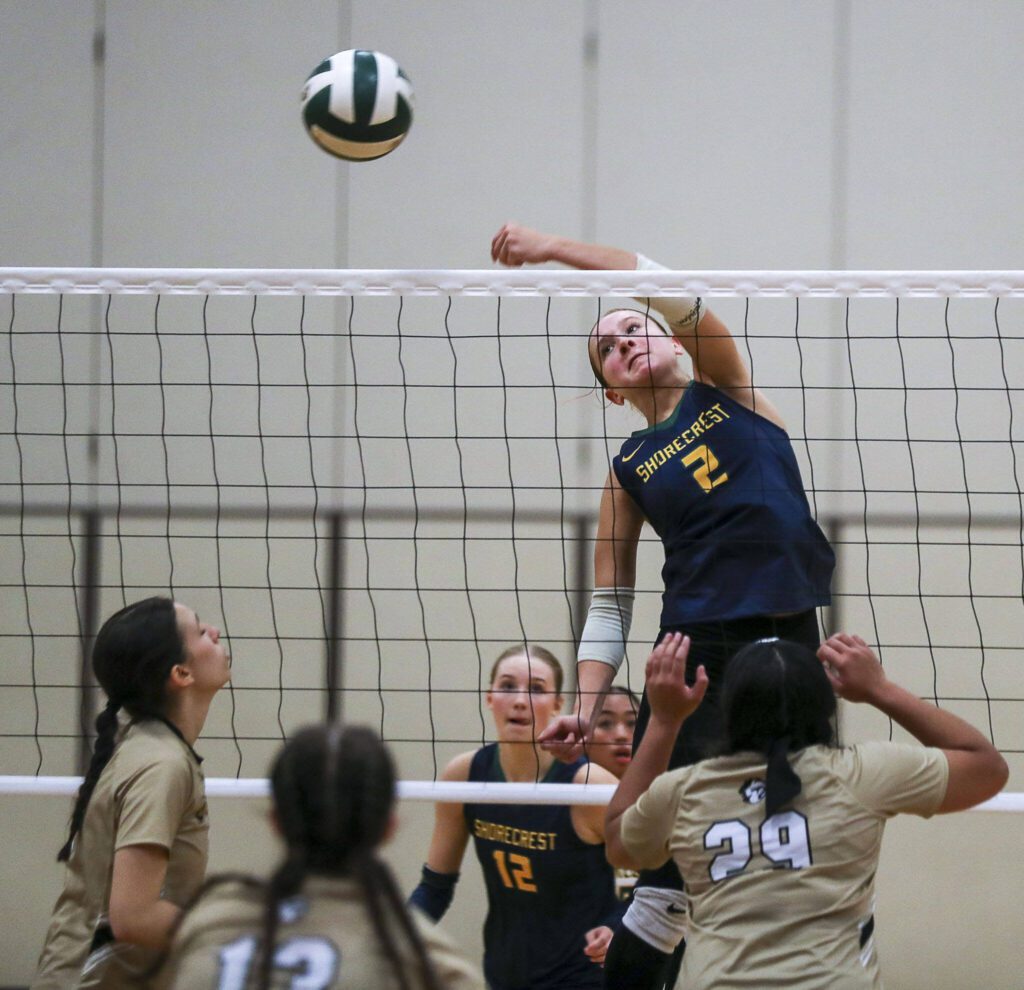 Shorecrest’s Violet Burchak (2) hits the ball during a volleyball game between Lynnwood and Shorecrest at Shorecrest High School in Shoreline, Washington on Tuesday, Oct. 3, 2023. Lynnwood took the win. (Annie Barker / The Herald)
