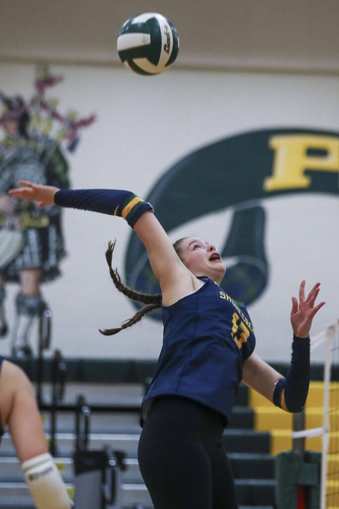 Shorecrest’s Emmeline Koenig (13) hits the ball during a volleyball game between Lynnwood and Shorecrest at Shorecrest High School in Shoreline, Washington on Tuesday, Oct. 3, 2023. Lynnwood took the win. (Annie Barker / The Herald)

