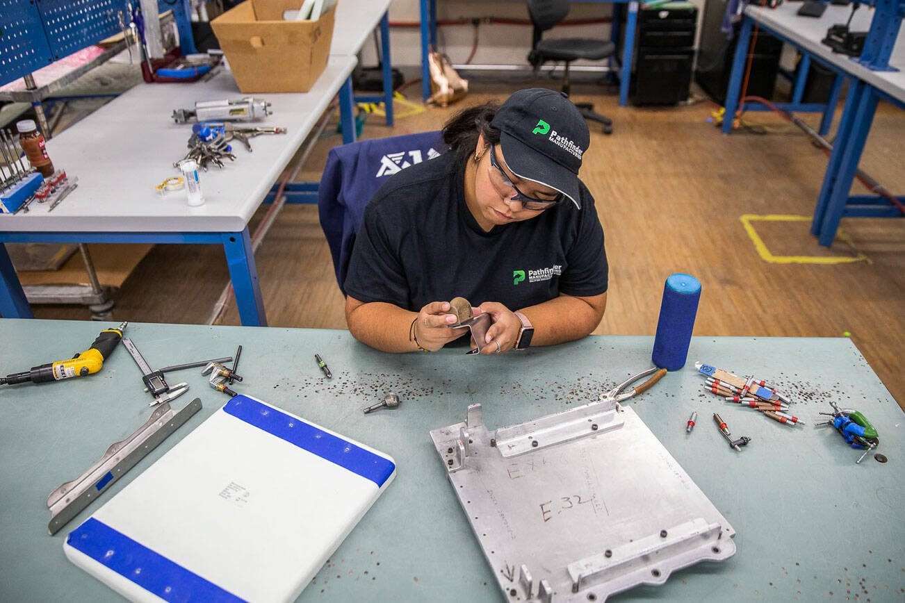 Dominique Gonzalez works at Pathfinder Manufacturing on Tuesday, Oct. 10, 2023 in Everett, Washington. (Olivia Vanni / The Herald)