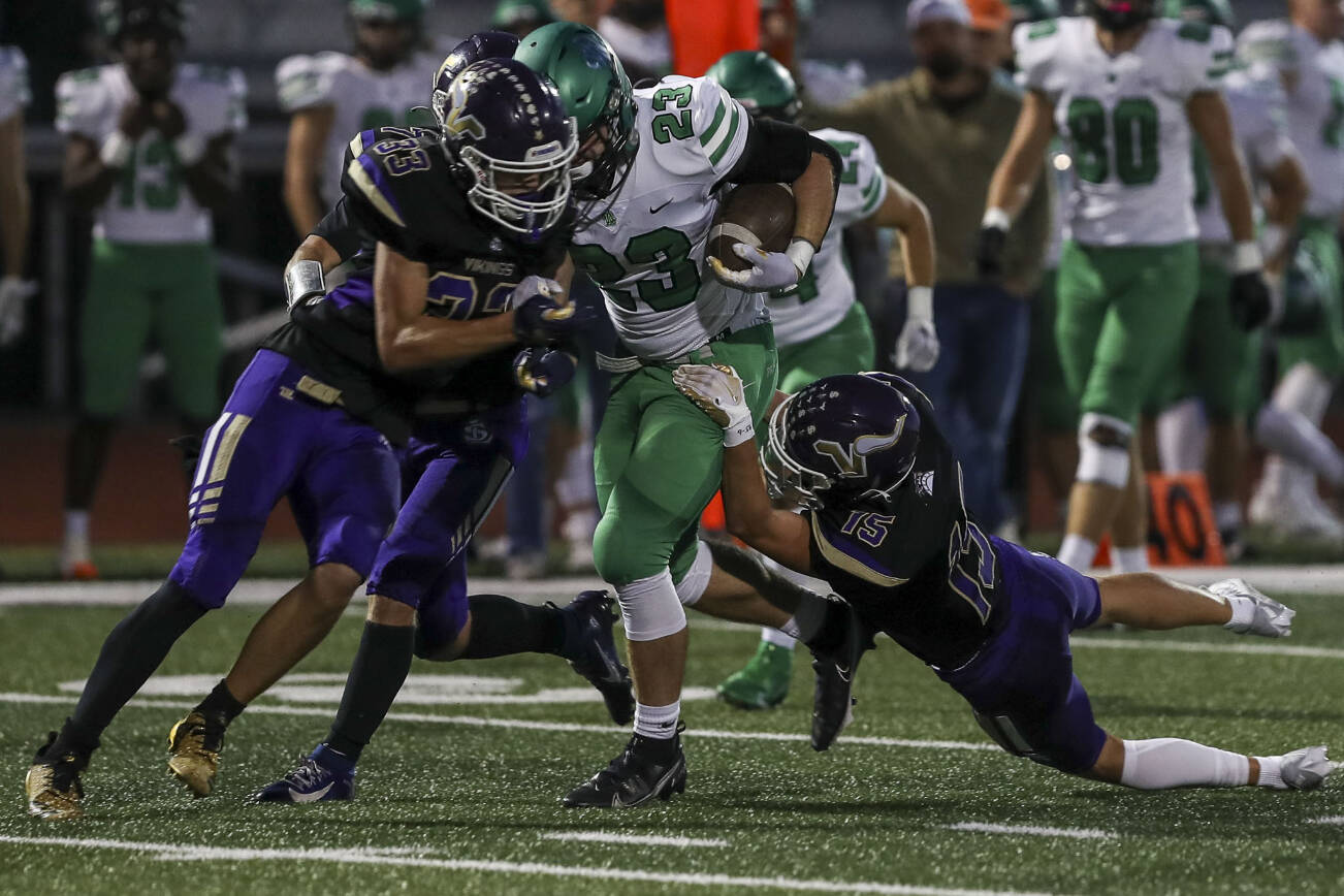 West Linn’s Ryan Vandenbrink (23) runs with the ball during a football game between Lake Stevens and West Linn at Lake Stevens High School in Lake Stevens, Washington on Friday, Sept. 22, 2023. West Linn won, 49-30. (Annie Barker / The Herald)