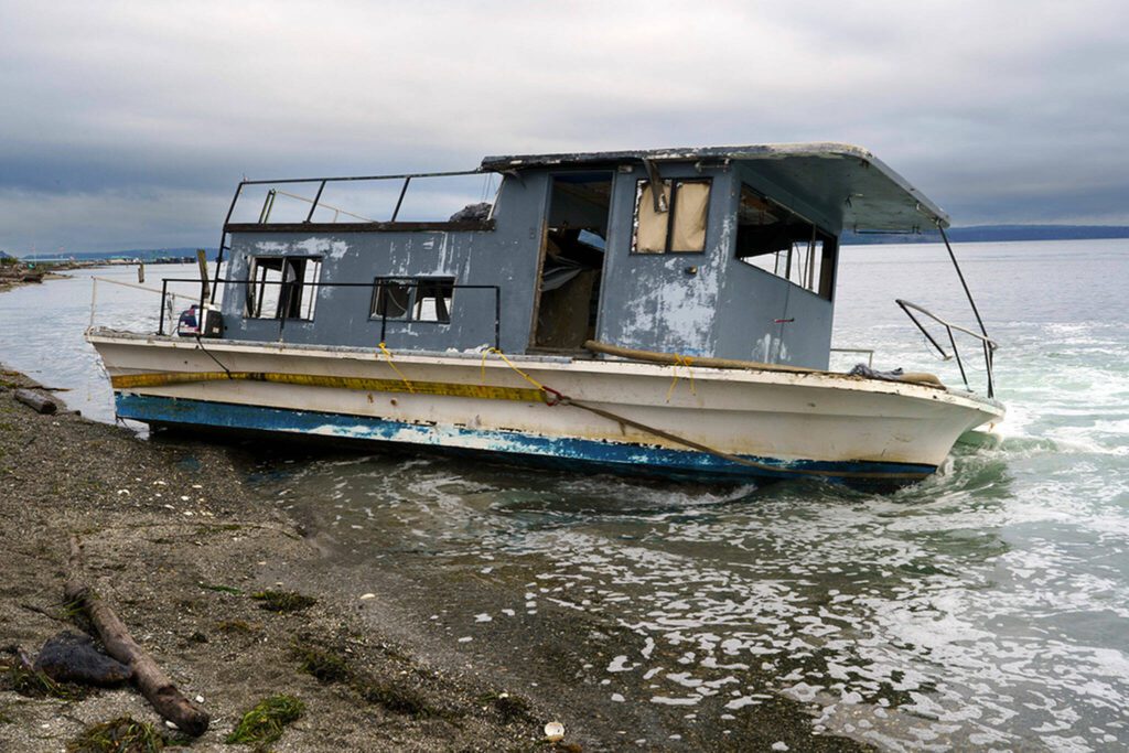 The state Department of Natural Resources authorized the removal of an abandoned and derelict vessel, known as the Madahy, last week. (Photo by David Welton)
