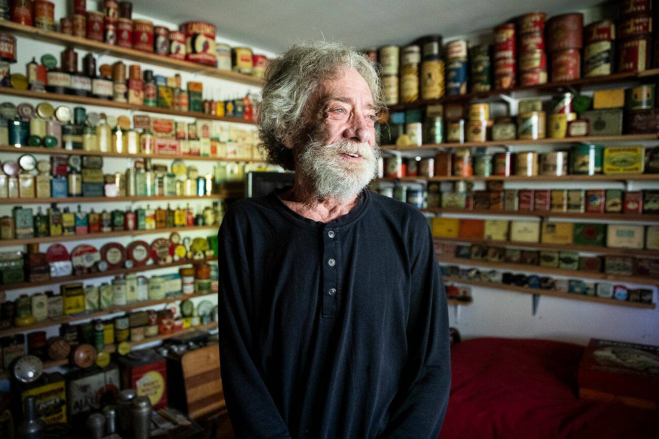 Daniel Weiss, 73, inside his “tin room” at his home that holds the majority of his expansive tin collection on Thursday, Oct. 12, 2023 in Mountlake, Washington. (Olivia Vanni / The Herald)