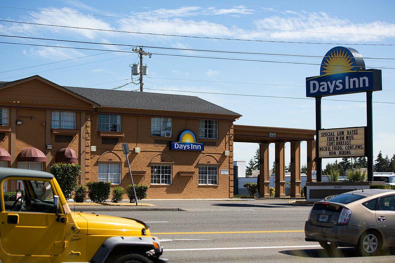 The Days Inn on Everett Mall Way, which Snohomish County is set to purchase and convert into emergency housing, is seen Monday, Aug. 8, 2022, in Everett, Washington. (Ryan Berry / The Herald)